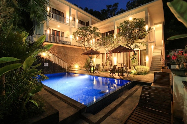 Outdoor pool, open 6:00 AM to 10:00 PM, pool umbrellas, sun loungers