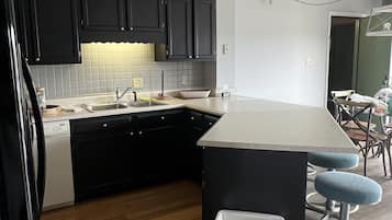 Condo, 3 Bedrooms | Private kitchen | Fridge, microwave, dishwasher, coffee/tea maker