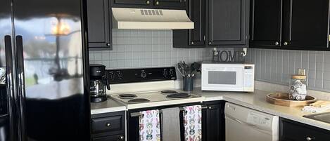 Condo, 3 Bedrooms | Private kitchen | Fridge, microwave, dishwasher, coffee/tea maker