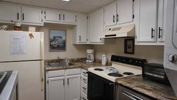 Condo, 2 Bedrooms | Private kitchen | Fridge, coffee/tea maker