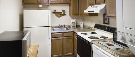 Condo, 2 Bedrooms | Private kitchen | Fridge, coffee/tea maker