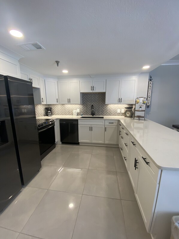 Condo, 3 Bedrooms | Private kitchen | Fridge, coffee/tea maker