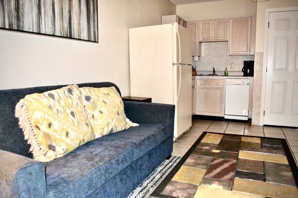 Apartment, 1 Schlafzimmer | Wohnbereich | Kamin