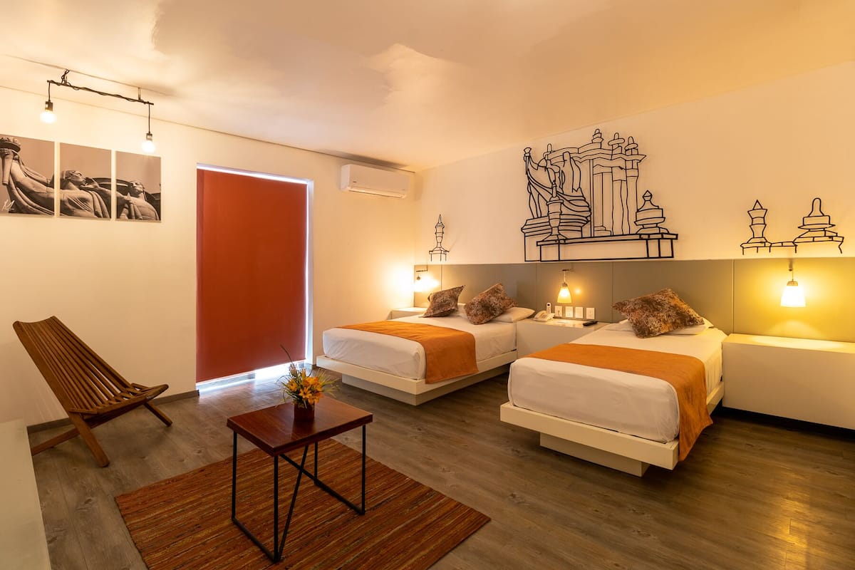 basic double room, multiple beds, non smoking, mountain view | in-room safe, blackout curtains, iron/ironing board, rollaway beds