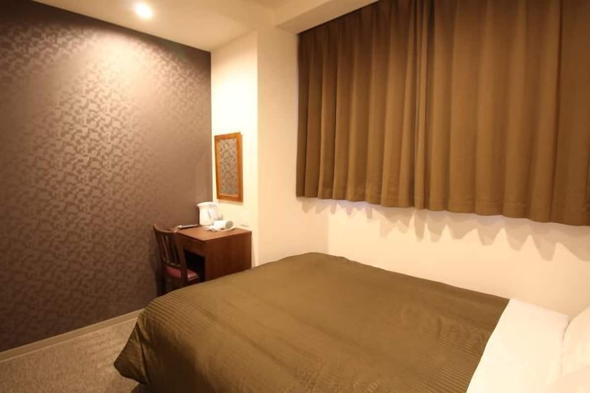 Desk, laptop workspace, blackout curtains, iron/ironing board