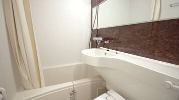 Combined shower/tub, deep soaking tub, free toiletries, hair dryer