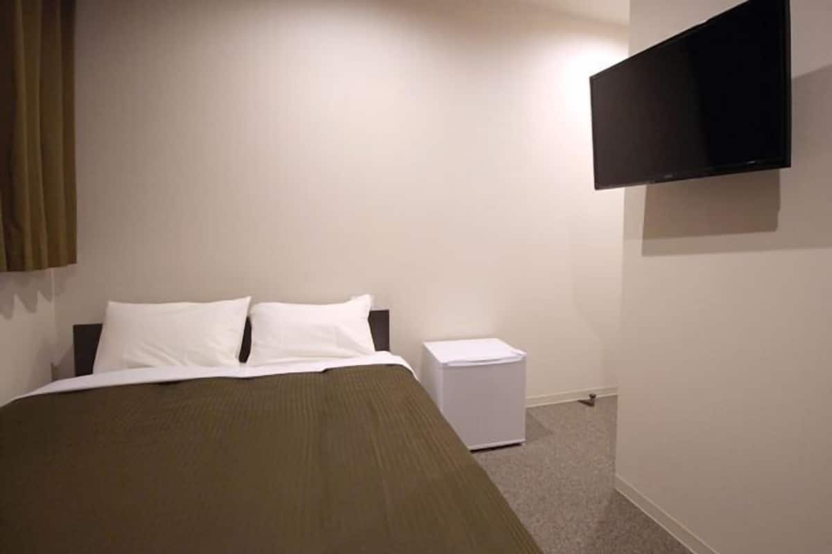 Desk, laptop workspace, blackout curtains, iron/ironing board