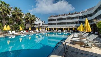Indoor pool, outdoor pool, open 8:00 AM to 7:00 PM, pool umbrellas