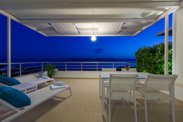 50-inch flat-screen TV with cable channels, TV