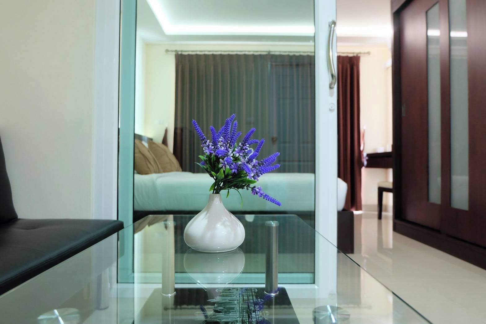 1-Bedroom Premium Room | Living area | Flat-screen TV