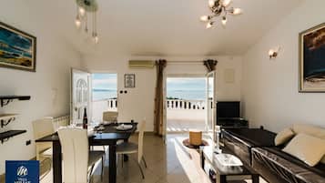 Standard Villa, Multiple Beds, Non Smoking | Living area | Flat-screen TV