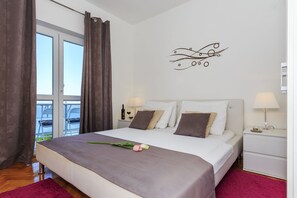 Appartement Standard, 2 grands lits, vue mer | Fer et planche à repasser, Wi-Fi gratuit, draps fournis