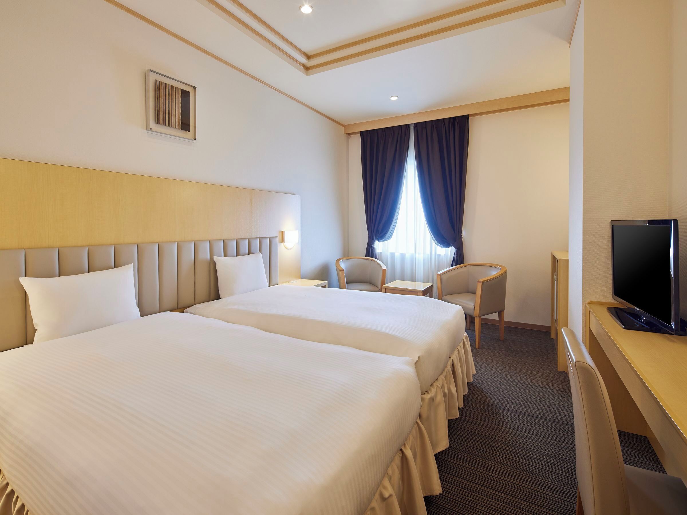 Superior Twin Room (Non-smoking) | In-room safe, desk, blackout drapes, iron/ironing board