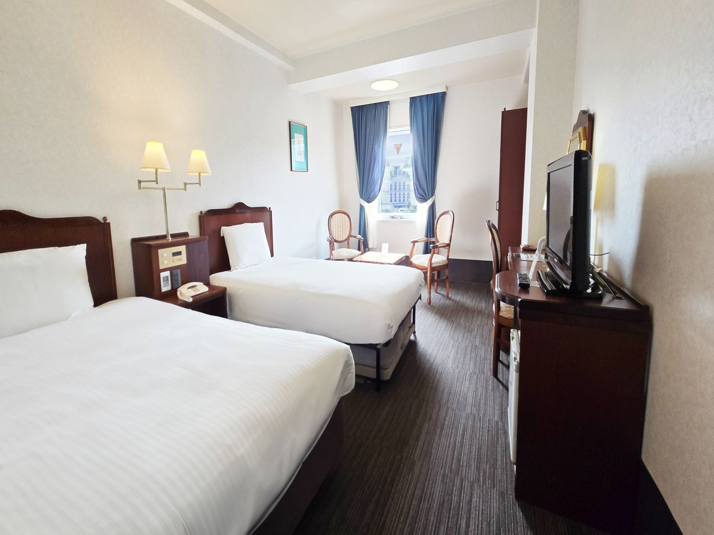 Standard Twin Room (Non-smoking) | In-room safe, desk, blackout drapes, iron/ironing board