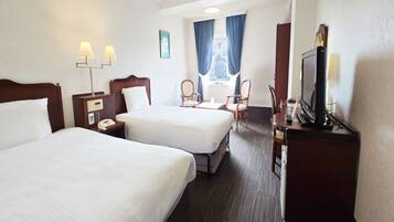 Standard Twin Room (Non-smoking) | In-room safe, desk, blackout drapes, iron/ironing board