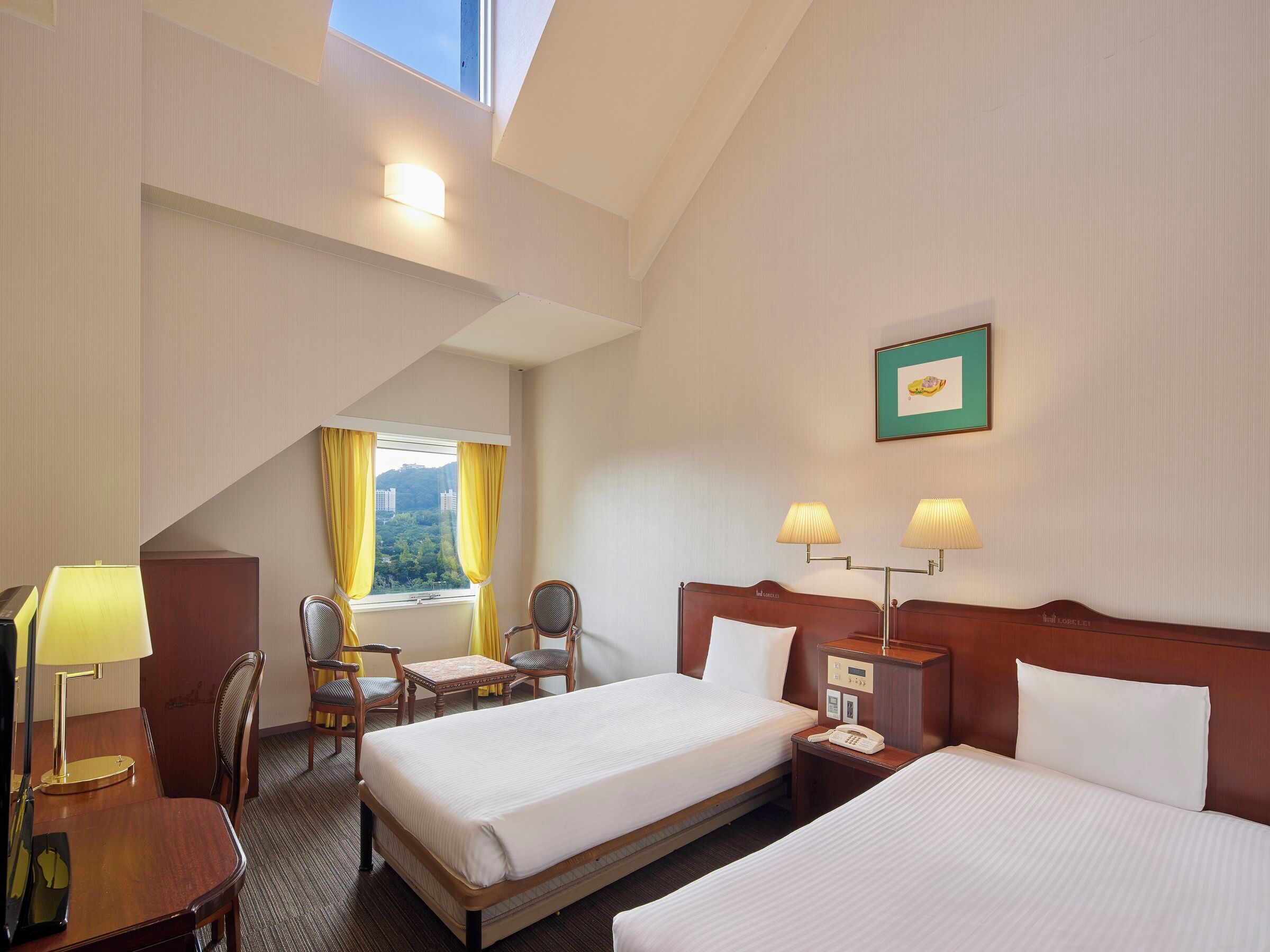 Sky Twin Room(Non-smoking) | In-room safe, desk, blackout drapes, iron/ironing board