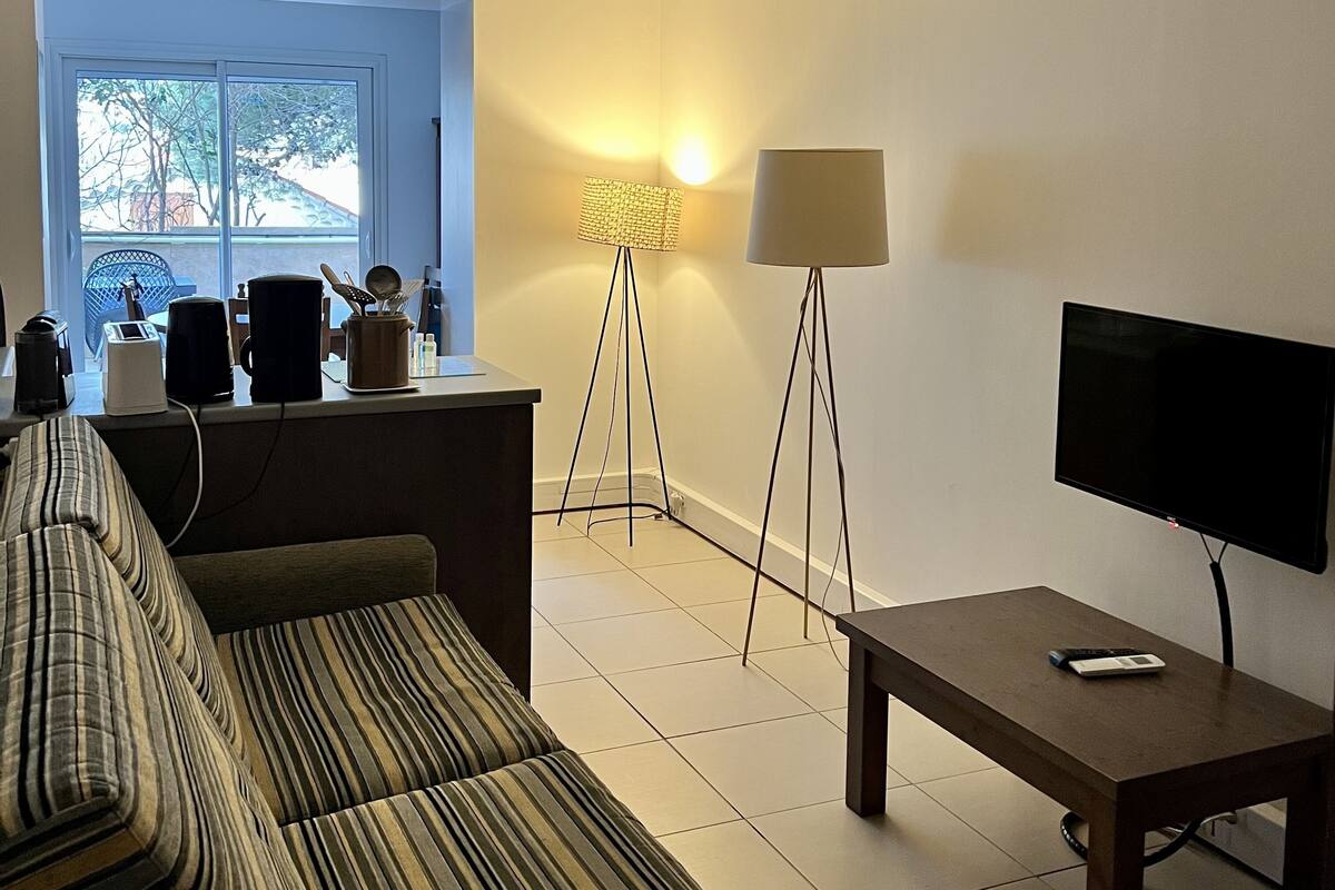 comfort apartment | living area | flat-screen tv