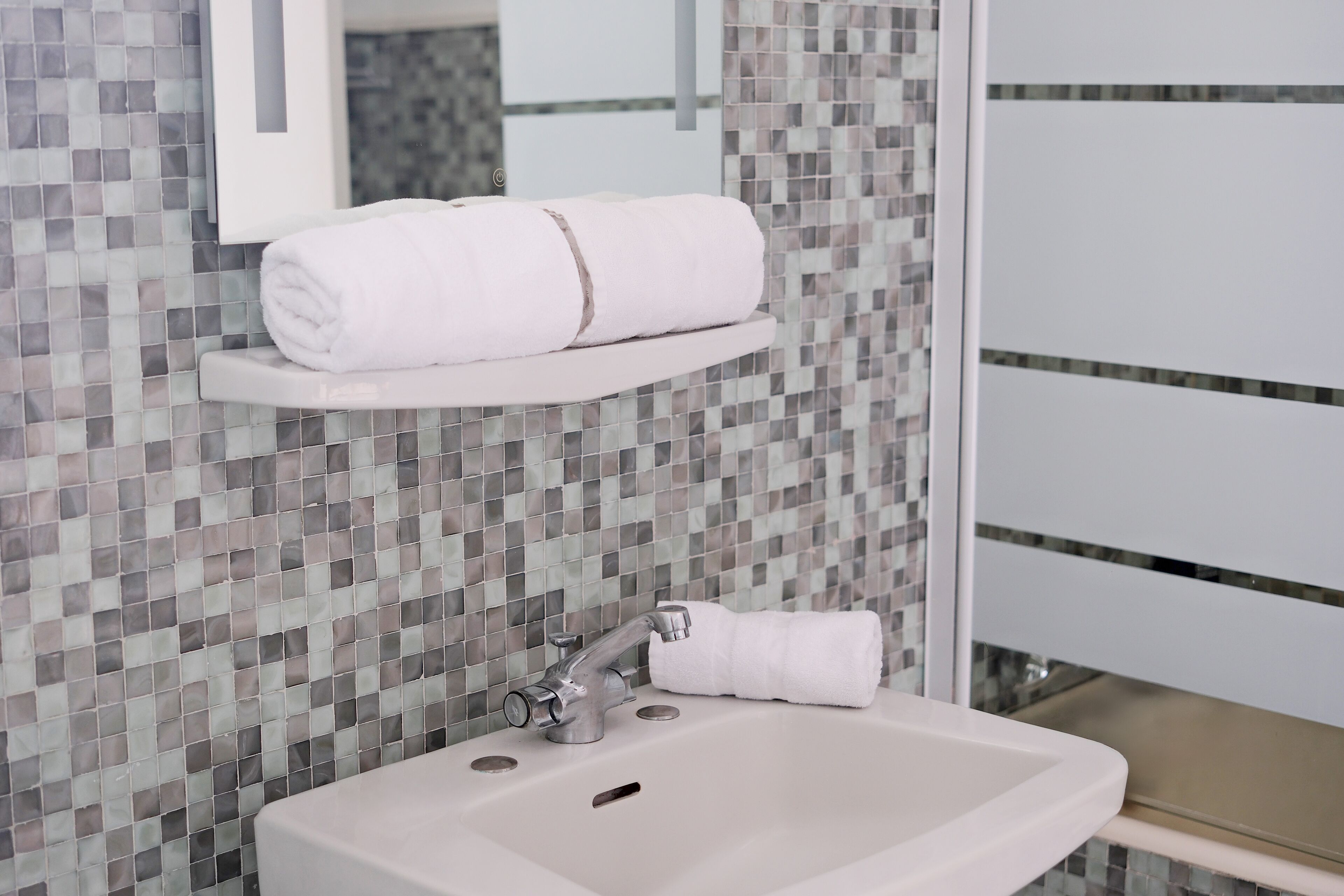 hair dryer, towels, soap, shampoo