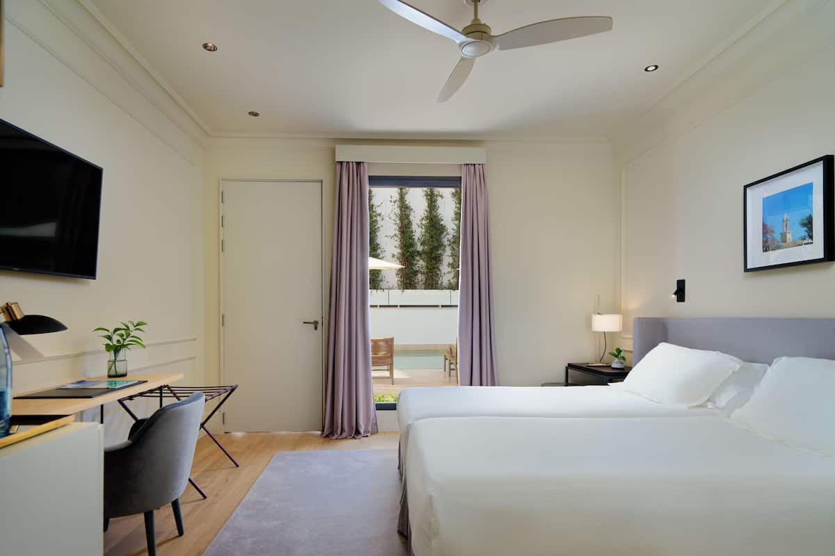 1 Schlafzimmer, hochwertige Bettwaren, Daunenbettdecken, Minibar