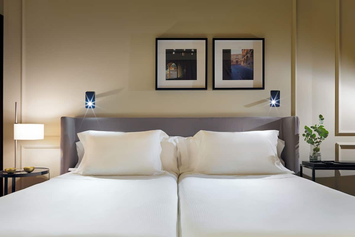 1 Schlafzimmer, hochwertige Bettwaren, Daunenbettdecken, Minibar