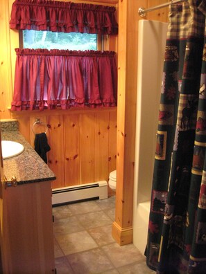 Combined shower/tub