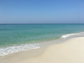 On the beach, sun-loungers