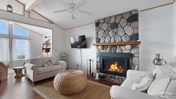 Smart TV, fireplace, DVD player, books