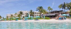 On the beach, sun loungers, beach towels - Beautiful ocean front Coral Gardens- 
Grace Bay Beach, 2 bedroom, sleeps 6 (Grace Bay)