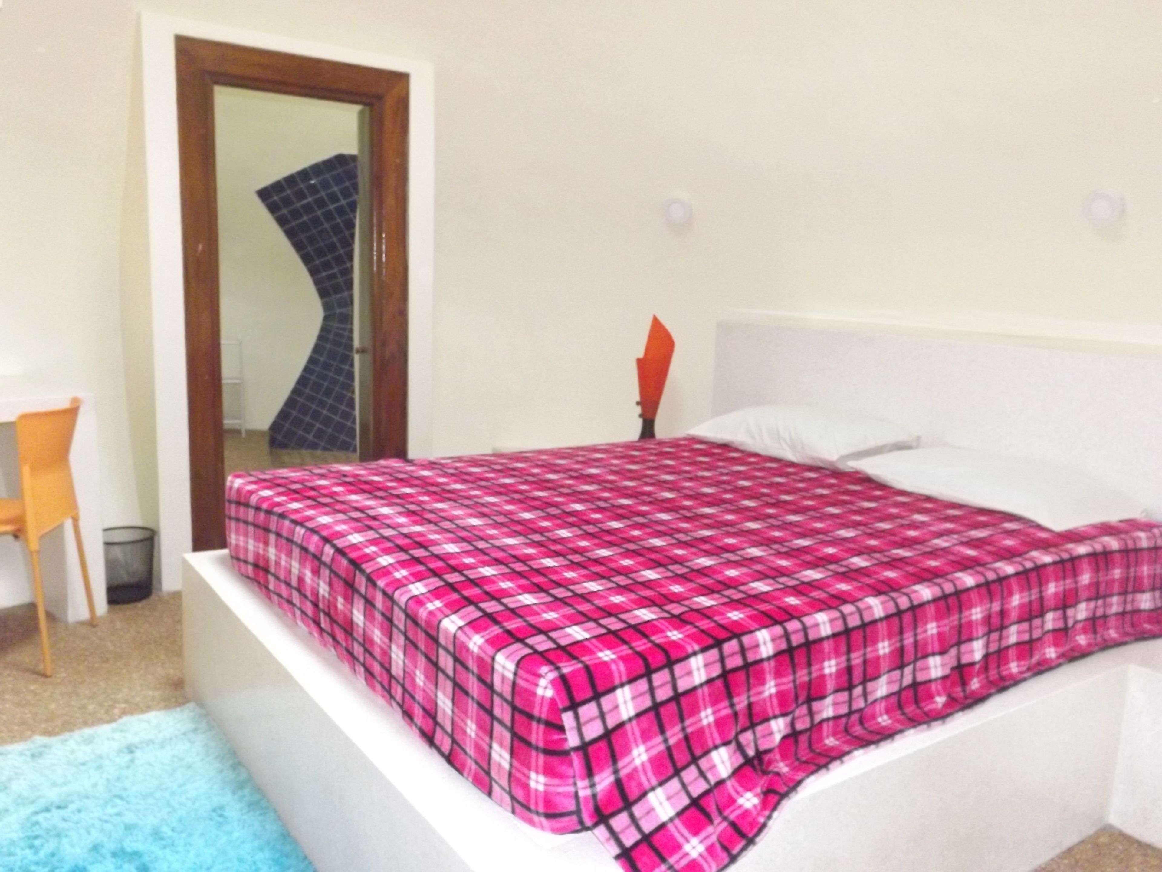 Deluxe villa, 2 slaapkamers | 2 slaapkamers, een bureau, een strijkplank/strijkijzer