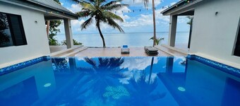 Sunny/Solar ways, a private beachfront location,  add transfers & chef meals.