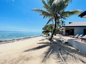 On the beach, sun-loungers, beach towels