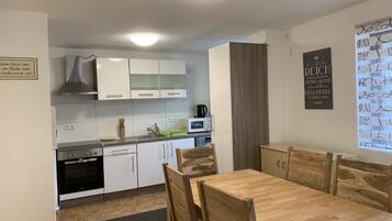 Fridge, microwave, oven, cookware/dishes/utensils
