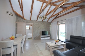 Deluxe Apartment, 4 Bedrooms (A4) | Living area | Flat-screen TV - Adriatic Residence (Becici)