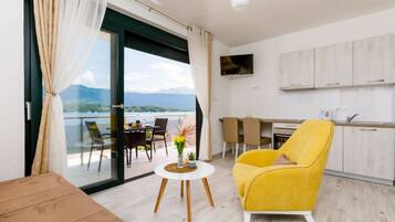 Basic Apartment, Sea View | Living area | LCD TV