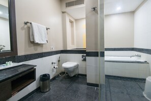 Superior Suite, 1 Queen Bed, Non Smoking | Bathroom | Shower, rainfall showerhead, free toiletries, towels