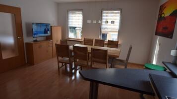 Apartment, 4 Bedrooms (111) | Living area | Flat-screen TV