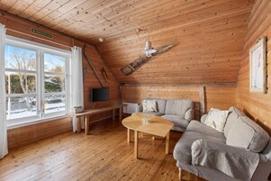 Apartment, 2 Bedrooms (Rorbu 2) | Living room | Flat-screen TV, heated floors