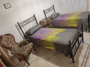 Apartament urbà | Planxa i posts de planxar, wifi gratuïta i roba de llit 