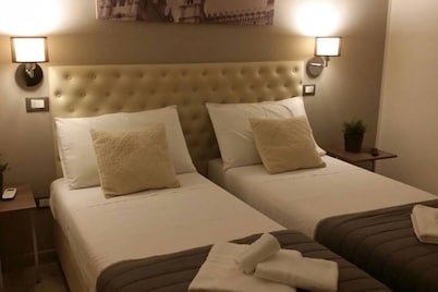 Apartment in the historic center with three bedrooms and en-suite bathrooms