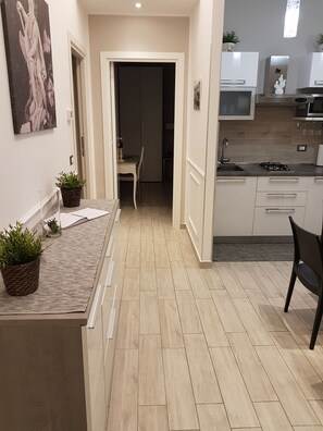 Fridge, microwave, stovetop, coffee/tea maker