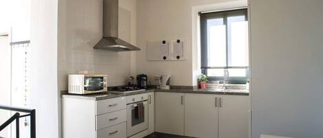 Oven, stovetop, dishwasher, coffee/tea maker