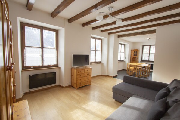 Apartment, Mountain View | Living area | Flat-screen TV, toys