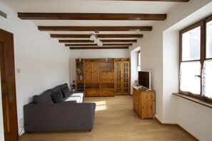 Apartment, Mountain View | Living area | Flat-screen TV, toys