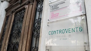 A sign with "INTERNATIONAL TALENT SUPPORT" and "ITS CREATIVE ARCHIVE" on a building facade. - ControVento (Trieste)