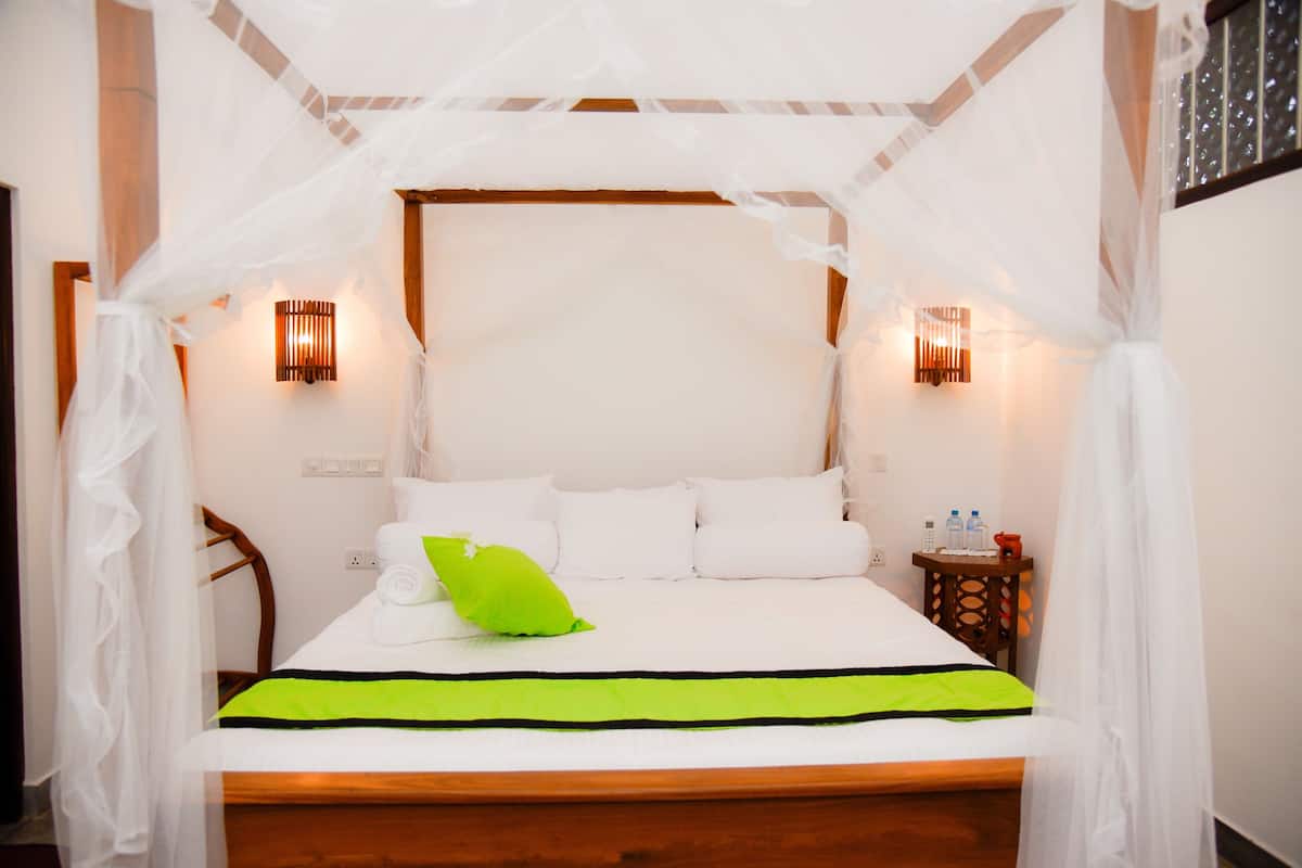 Deluxe Room | 1 bedroom, hypo-allergenic bedding, down comforters, pillowtop beds