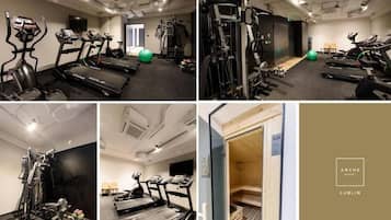 A gym with treadmills, weights, and exercise balls.