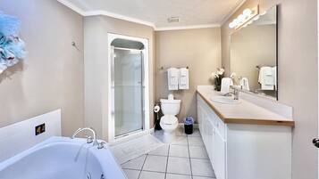 Bathtub, jetted tub, hair dryer, towels