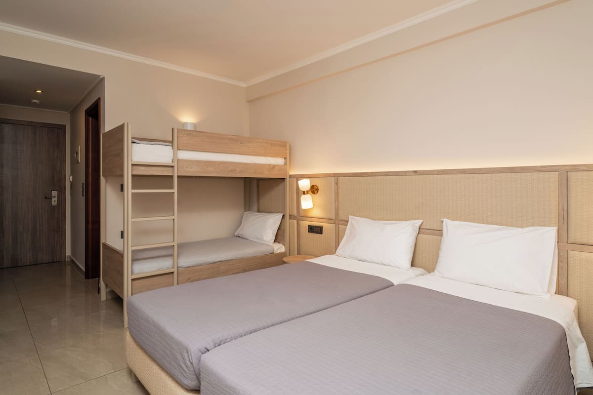 Standard Family Room | In-room safe, individually furnished, blackout drapes, soundproofing