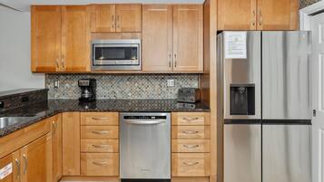 Condo, 2 Bedrooms | Private kitchen | Fridge, microwave, oven, dishwasher