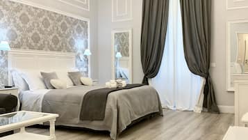 Junior Suite | 1 bedroom, premium bedding, down comforters, minibar